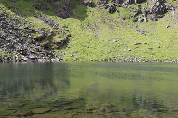 View across a tarn in the Lake District
