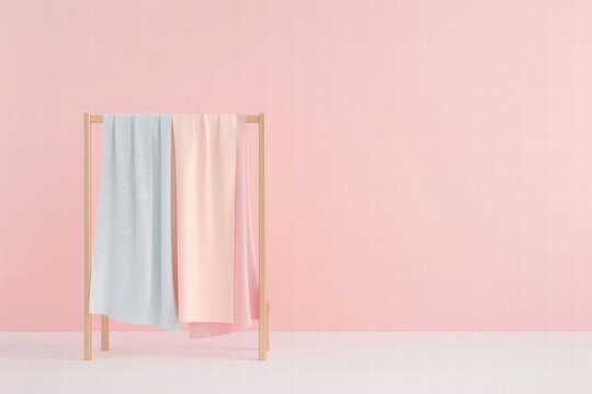 A high-fashion pastel clothing arrangement inspired by Vogue aesthetics, featuring soft tones and a sleek, stylish wardrobe setup