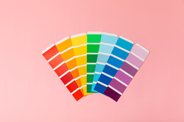 Color palette on a bright colored background. Color palette guide. paper catalog of rainbow color....