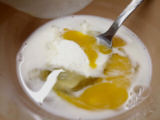 
Omelet with cream and cheese. Food preparation process.