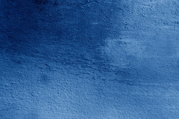 blue background surface with dark light parts and relief.