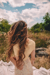 young woman in a field
