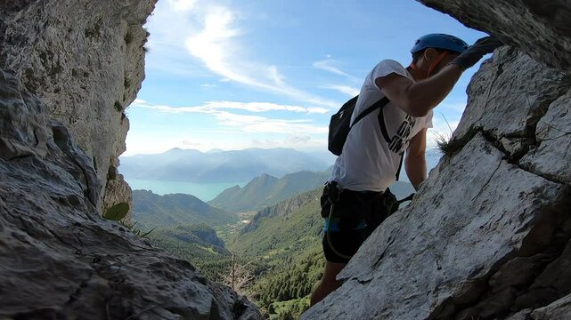 Climbing Corno del Bene Via Ferrata with Lake Iseo Panorama, Italy