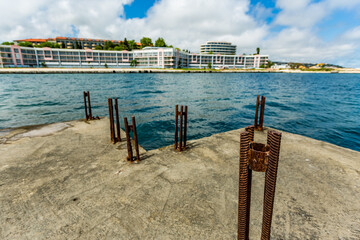 View of abandoned sea resort concrete buildings and structures in ruins near St. Constantine and Helena, city of Varna, Bulgaria, the shores of Black Sea, EU
