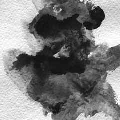 A watercolor background with black splashes