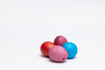 Four colored Easter eggs  on the white background  ready  for Easter
