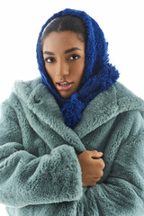 Chic young woman in stylish outerwear embraces modern fashion with elegant flair