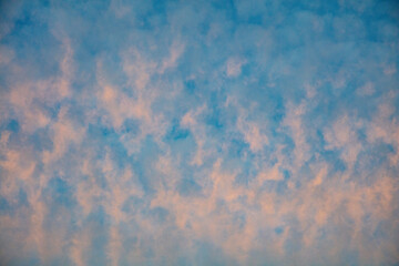 Morning has broken with a beautiful blue sky painted with dappled clouds
