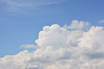 Blue Sky with Fluffy Clouds