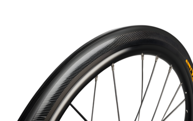 A lightweight carbon fiber road bike wheel, isolated on a empty plain background