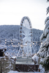 Ferris wheel in the winter mountains