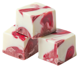 Three white chocolate and red valvet marble fudge cubes stacked dessert ketchup food.