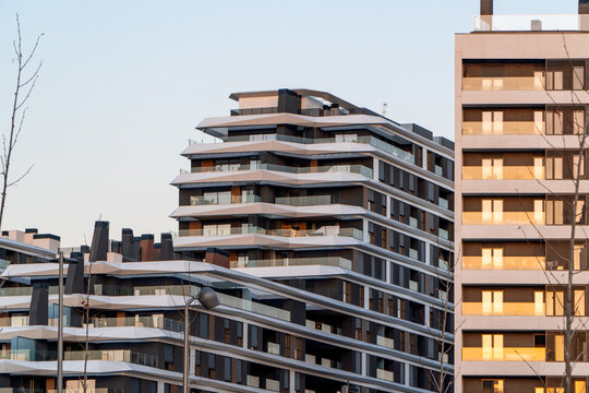 Modern apartment buildings at sunset