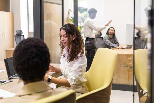 Collaborative team working in modern office environment