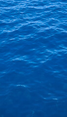 Obraz premium Blue sea water photo background texture with ripple. with white shades