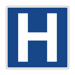 Road sign hospital. Information sign warns drivers about the presence of a nearby medical institution such as a hospital, clinic or first aid station. H symbol.