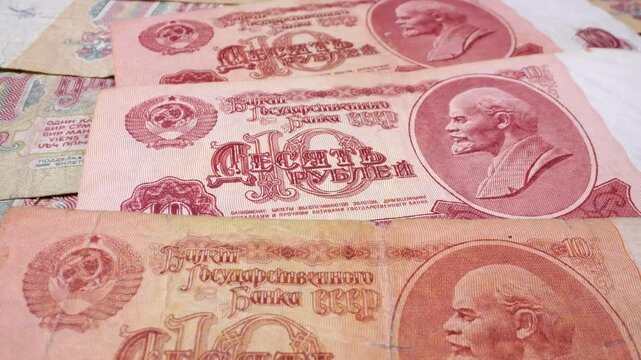 Close-up of 10 old Soviet ruble banknotes (1961&ndash;1993) with a sliding motion