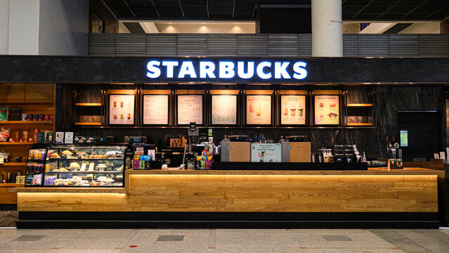 Bangkok,Thailand - May 3, 2023 : Starbucks coffee store brand logo sign, Starbucks Corporation is world's largest coffeehouse chain, trading in Nasdaq stock exchange.