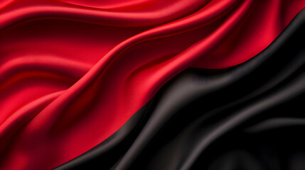 Obraz premium A close-up view of flowing red and black fabric, showcasing the rich texture and undulating waves, perfect for artistic projects.