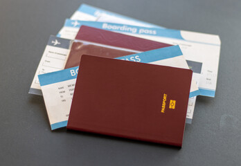 Passport and flight boarding passes, travel concept
