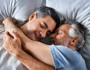 Fototapeta premium two older gay men sleeping together in cozy bedroom, homosexual male couple sleeping