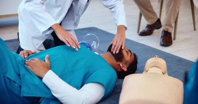 Hands, medical school and cpr for education, learning or practical training in hospital as students. People, emergency and healthcare for wellness, knowledge and first aid with instructor and explain