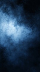 Fototapeta premium A dark blue smoky texture, creating a mysterious and atmospheric background.
