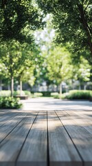 Scenic view of a wooden table in a vibrant park, surrounded by lush greenery and sunlight filtering through the trees.