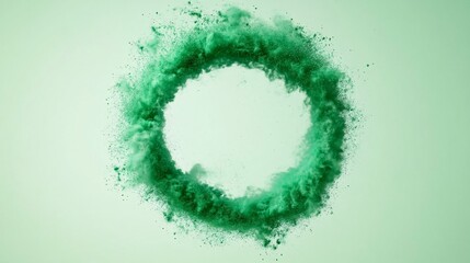 A mesmerizing green powder explosion creating a circular shape against a soft green backdrop.
