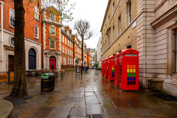 Obraz premium Five red phone boxes in Covent Garden, London, UK