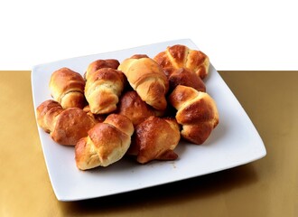 homemade tasty croissants with jam and cup of coffee