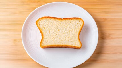 Soft and Airy Slice of Bread on White Plate