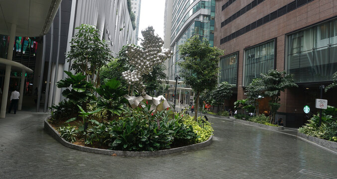 Singapore - January 20, 2025: CapitaSpring skyscraper with unique balcony with trees and plants, Designed by architectural firm BIG and Carlo Ratti