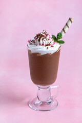 Milk chocolate drink with whipped cream.
