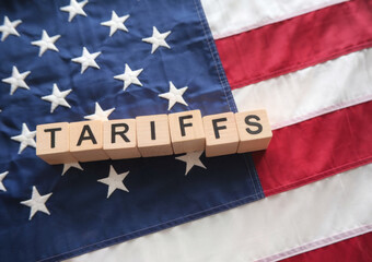 Fototapeta premium Import Trade Tariffs increase concept with United States of America Flag. Trade wars 
