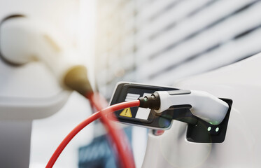 electric plug and socket, electric verhicle charging at station. 3d rendering