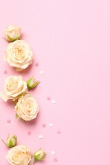 Beautiful composition with peony roses on color background
