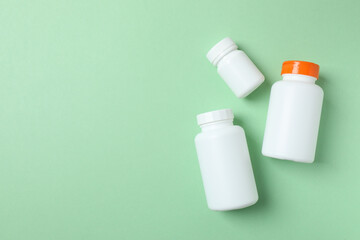 White bottles on a color background