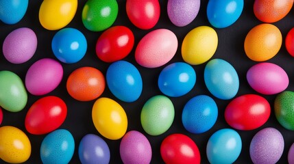 Obraz premium Colorful Easter Eggs Pattern - A vibrant collection of colorful Easter eggs arranged in a pleasing pattern. Symbolizing spring, new beginnings, celebration, hope, and joy