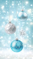 Festive blue and silver ornaments hanging against a sparkling winter background; ideal for holiday greeting cards