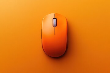 Bright orange computer mouse rests on an empty orange surface, showcasing a sleek design suitable for workspace organization or branding