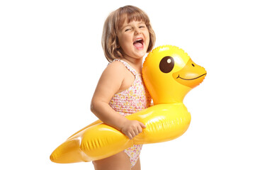 Girl in a swimsuit laughing and wearing a rubber duck swimming ring