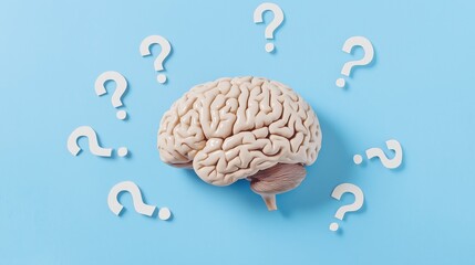 Brain surrounded by question marks on a blue background illustrating curiosity and inquiry in cognitive thought processes