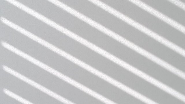 A white background with a shadow of a window. The shadow is made up of many thin lines