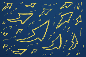 Many different yellow arrows on blue background