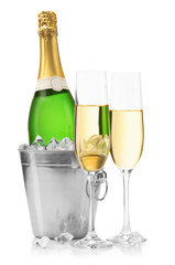 Champagne and bucket with ice isolated on white