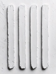 Four textured, white painted bars arranged vertically on a rough, white textured background.