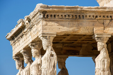 Caryatid women pillars on the Erechtheion in Athens, Greece.
