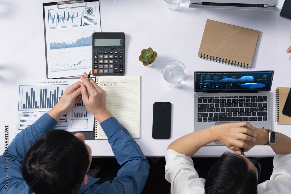 Poster Diverse corporate audit team or company bookkeeper and accountant consultant calculate account expenses and income budget for tax refunds using calculators in top view busy workspace. Prudent