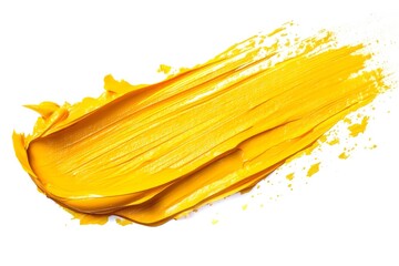 Thick yellow paint is being applied on a white background, creating a dynamic and colorful texture